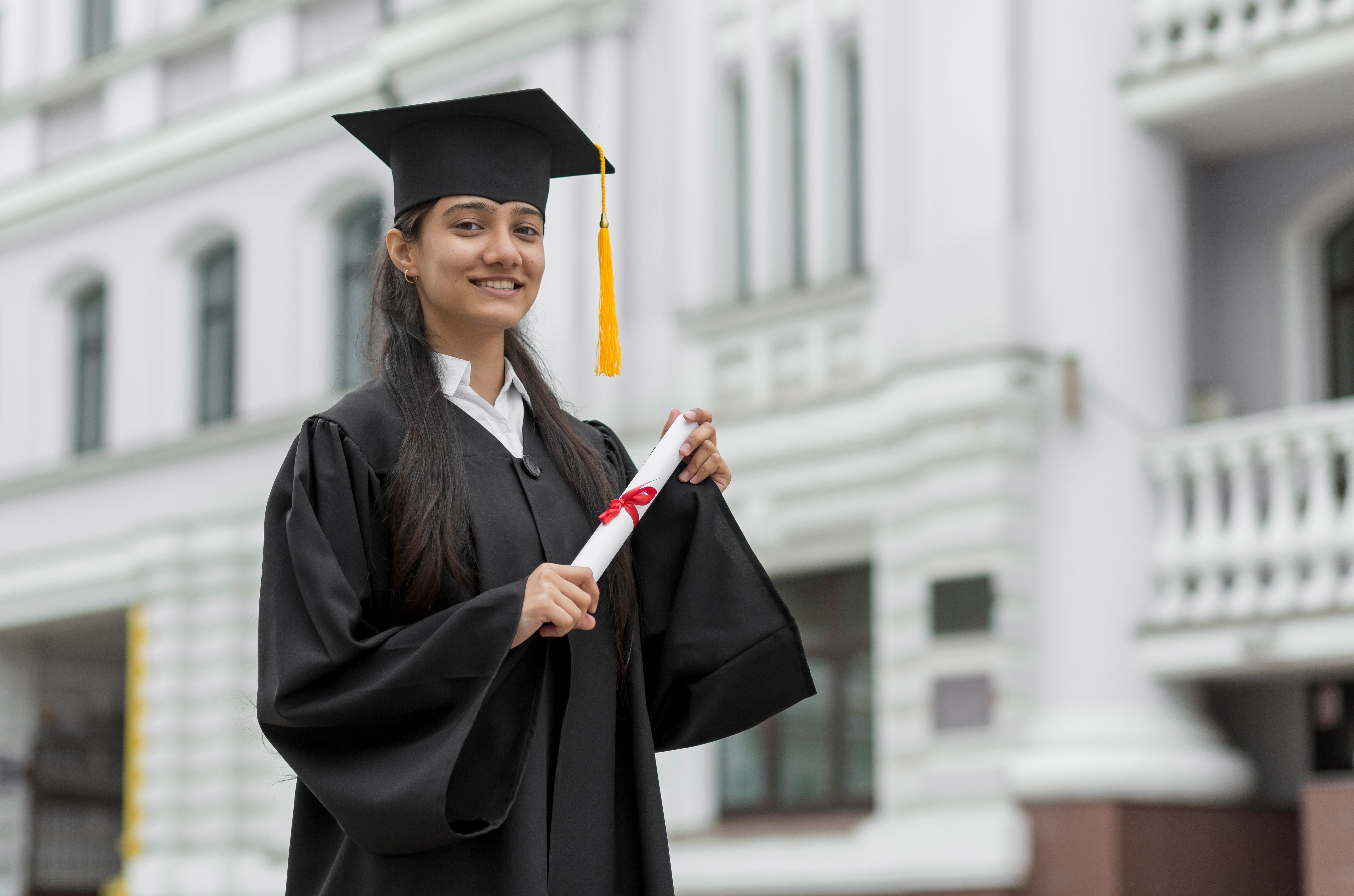 Graduation Glam: How to Elevate Your Cap and Gown with Statement Jewelry