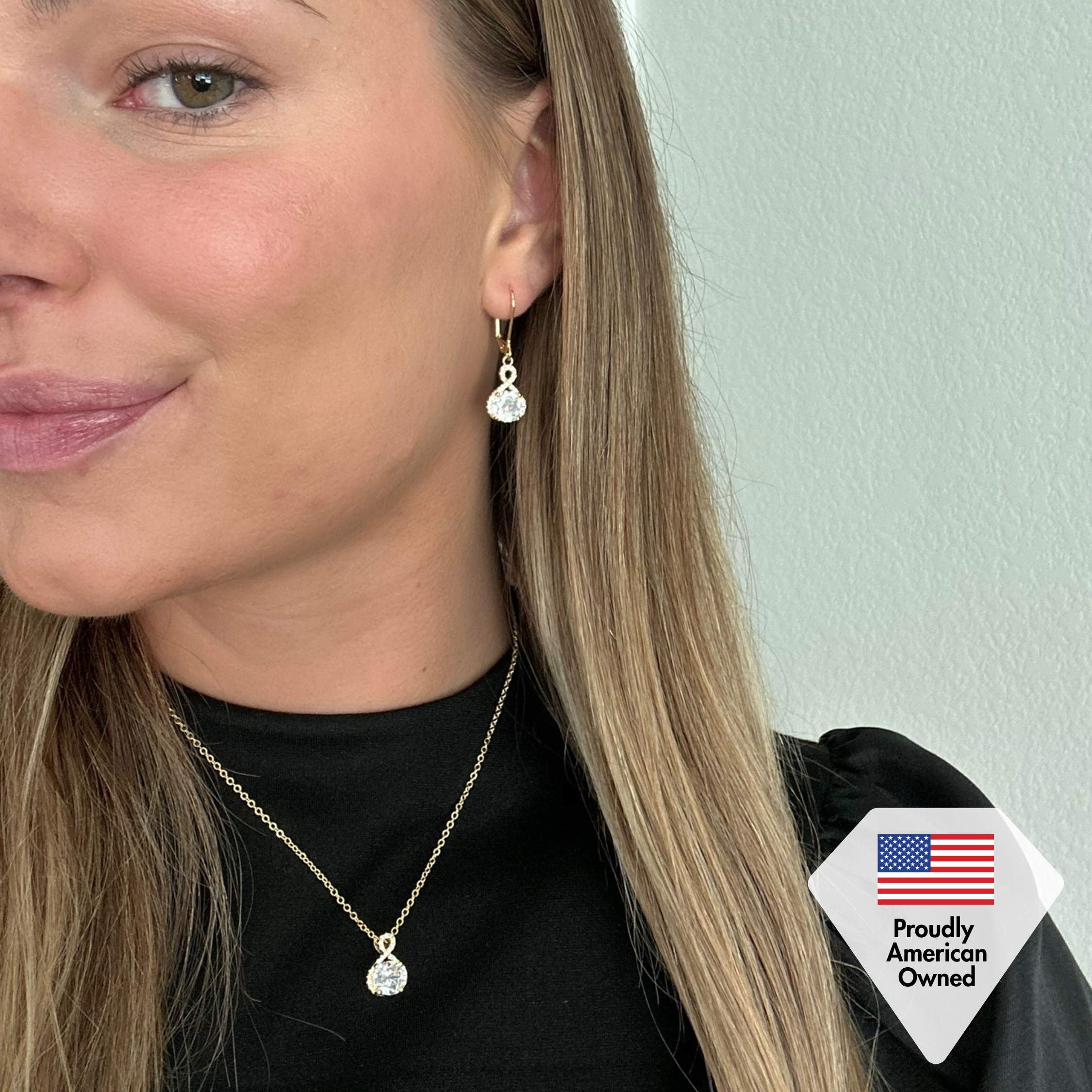 Alessandra 18k White Gold Plated Infinity Drop Earrings with Simulated Diamond Crystals